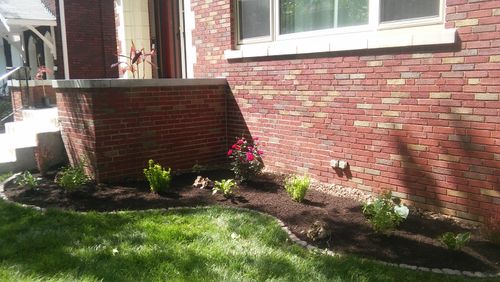 Mulch Installation for VQ Land & Stone in St. Louis, MO