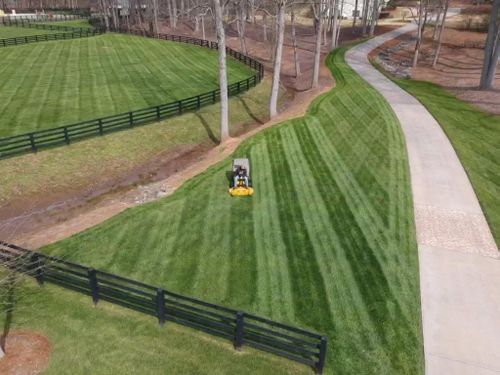 Mowing for Vivid Color Landscapes, LLC in Woodstock, GA