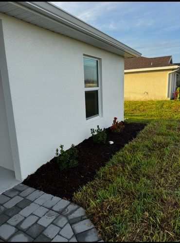 Mulch and rocks installation for BH Lawn & Landscape in LaBelle, FL