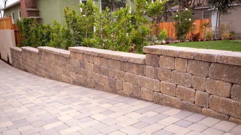 Stone Wall Installation for DG Stone & Landscaping Designs in DuPage County, Illinois