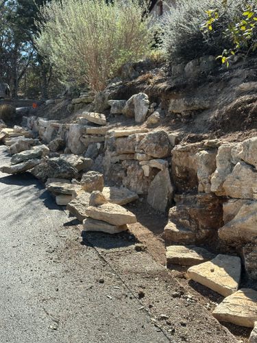 Retaining Wall Construction for Clean Green Landscape Design in Dripping Springs, TX