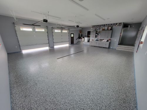 Ployaspartic Chip Coating for Majestic Concrete and Landscape in Cross Lake, MN