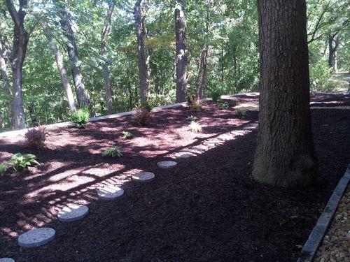 Mulch Installation for VQ Land & Stone in St. Louis, MO