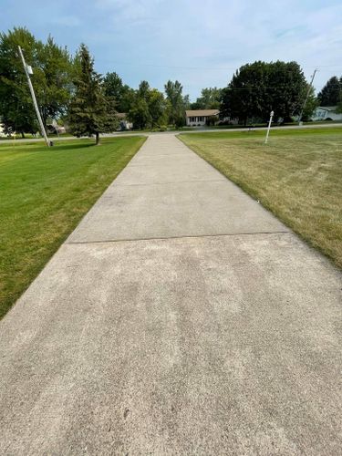 Drive and sidewalk for A&E Pressure Washing & Roof Cleaning LLC in Owosso, MI