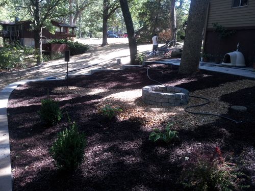 Mulch Installation for VQ Land & Stone in St. Louis, MO