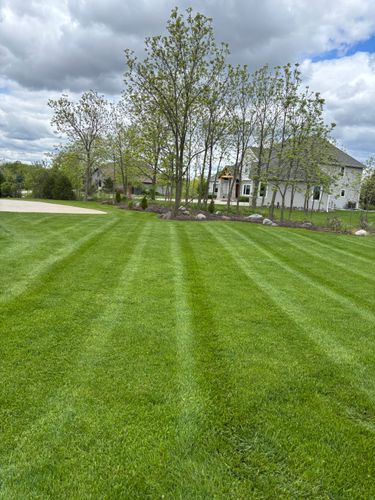Edging and Mulch Installation for H&L Lawn Care LLC in Twin Lakes, WI