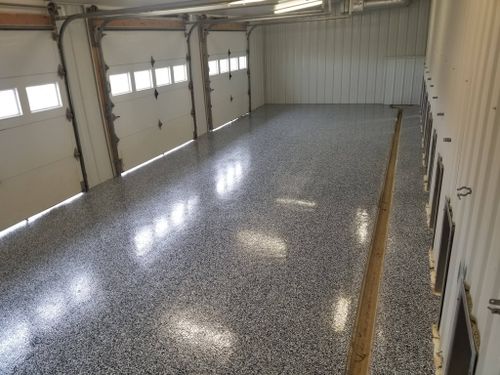 Ployaspartic Chip Coating for Majestic Concrete and Landscape in Cross Lake, MN