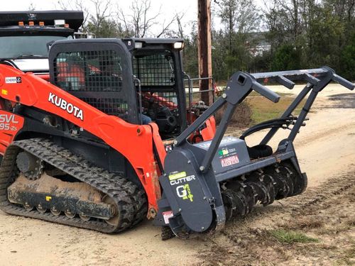 Land Clearing for Between The Hedges Landscape & Trucking LLC in Altha, FL