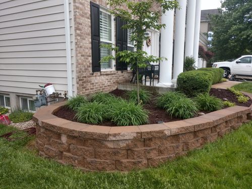 Mulch Installation for VQ Land & Stone in St. Louis, MO