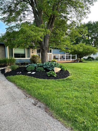 Mulch Installation for Solid Oak Lawn Care in East Grand Rapids, MI