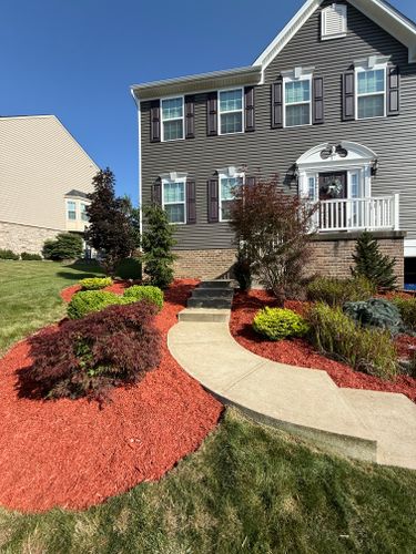 Mulch / River Rock installation for Green Hills Lawn Service in Washington, PA
