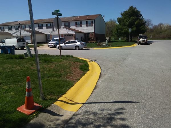 Concrete walkway halfway through a pressure wash