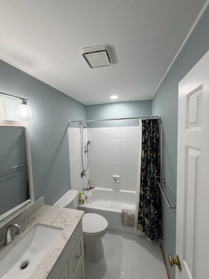 Updated bathroom with tile floor