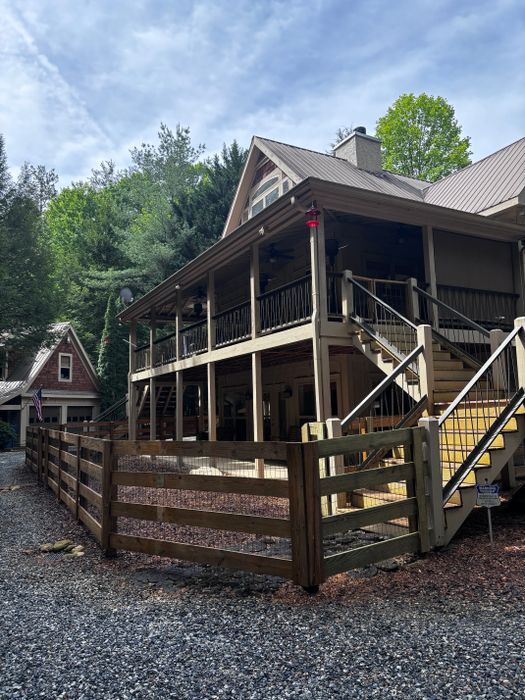 Wood rail fence around a mountain cabin
