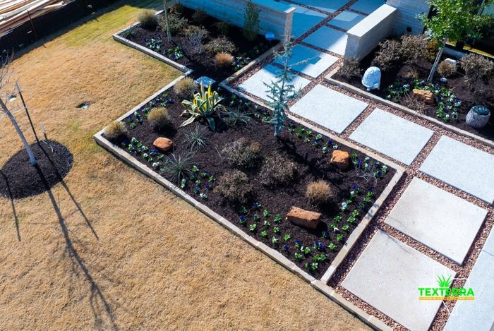 Paver path with gravel joints and new landscape beds