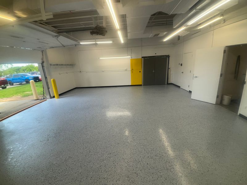 Wide view of a finished flake epoxy floor in a commercial room