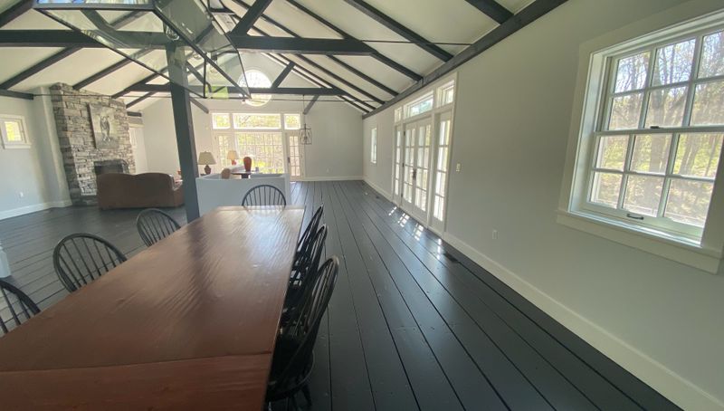 Long barn great room with dark floors