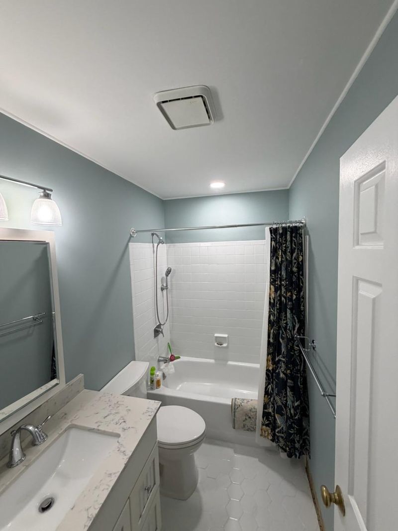 Updated bathroom with tile floor