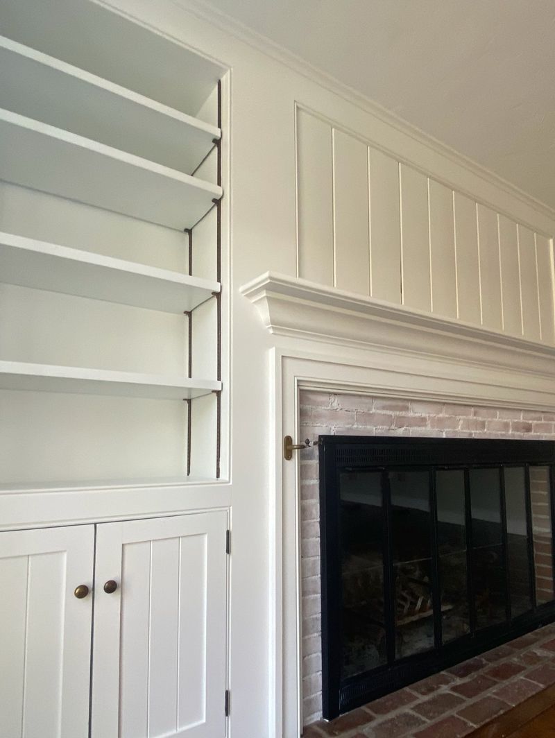 Built-ins beside a fireplace