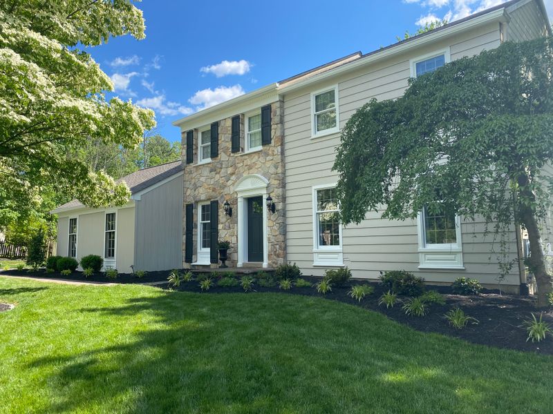 Colonial with a lawn