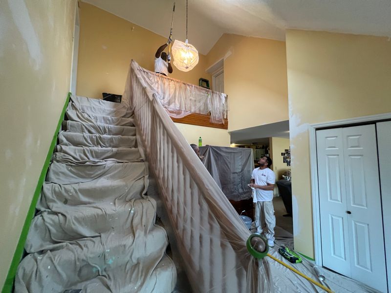 Revitalizing Elegance: Transformative Popcorn Repair and Repainting in Ona, WV Foyer