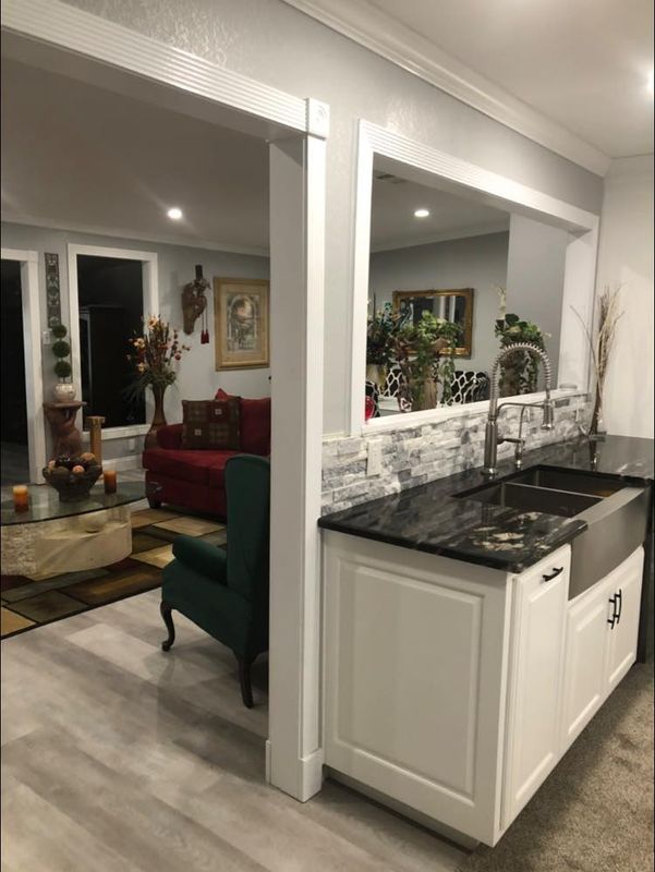 Revitalize Your Space: Stunning Hardwood Transformation by Hill's Carpet & Remodeling