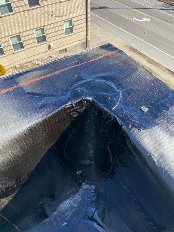 Modified bitumen flat roofing services