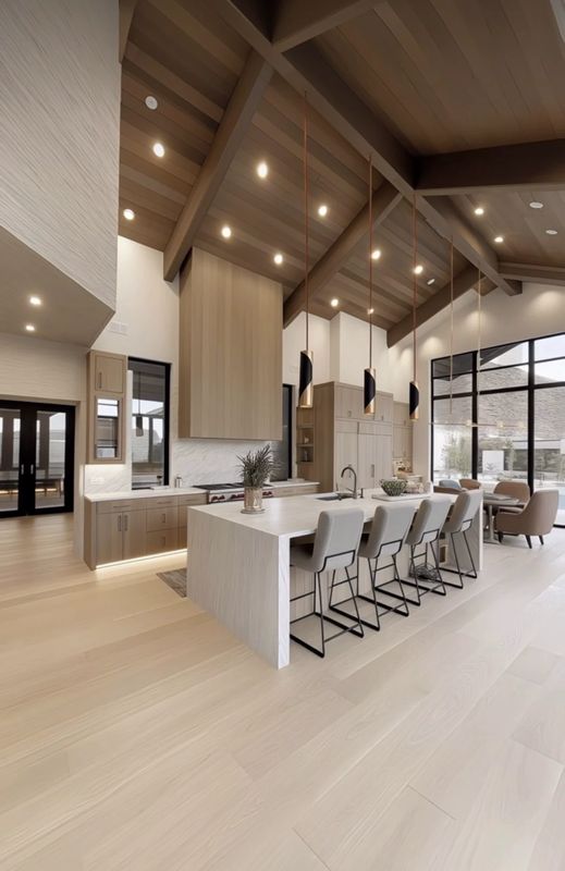 Elevating Modern Elegance: A Luxurious Open-Concept Kitchen Transformation by Luxurious Construction LLC