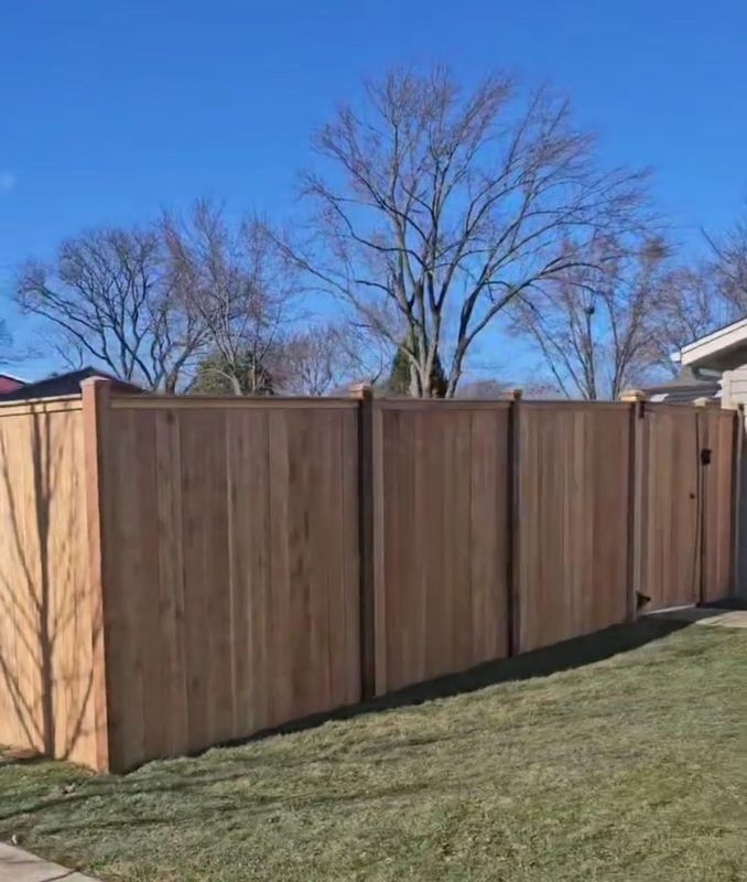 Elegant Privacy Enhancer: 6' High Solid Semi-Traditional Fence in Hoffman Estates