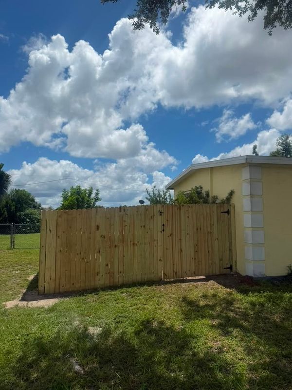 Custom Stockade Wood Privacy Fence Installation: Port Charlotte, FL