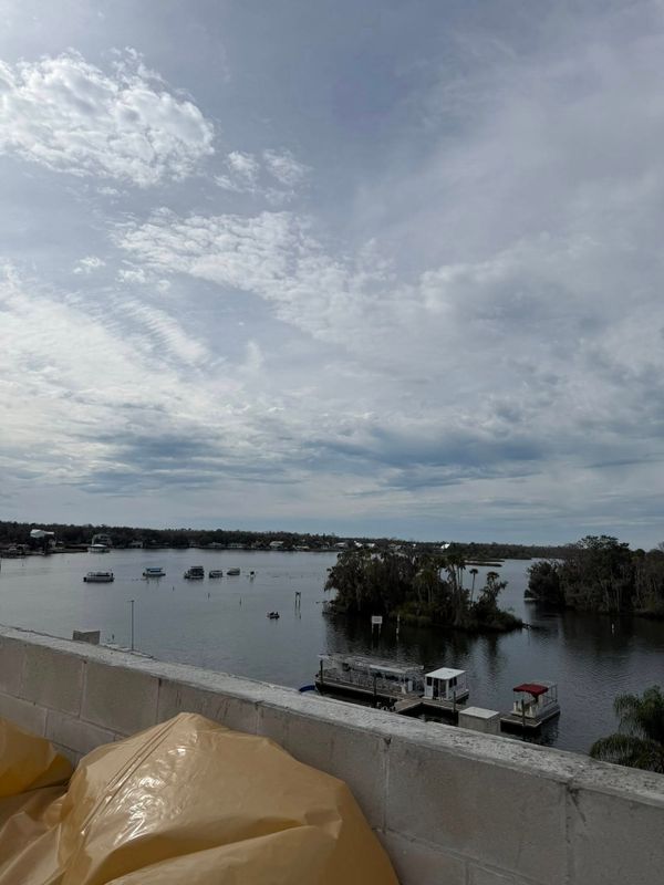 Precision Beyond Limits: Expert Concrete Cutting with Scenic Waterway Views