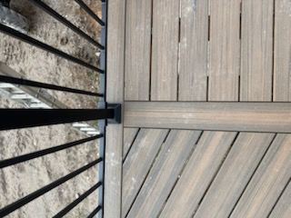 Trex Deck Transformation: A Stunning Yellow Bay Retreat by Dennison Construction