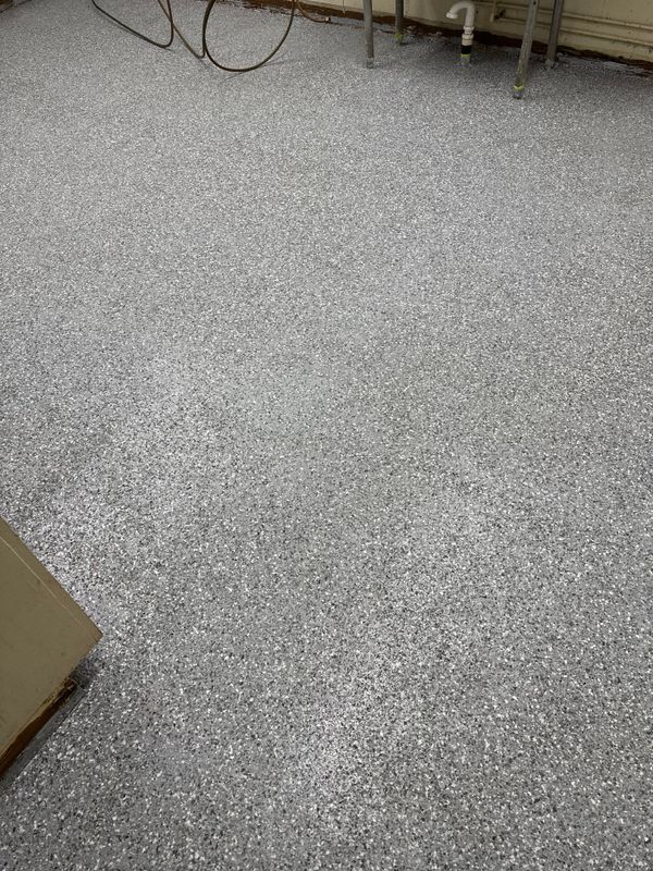 Transforming Floors with Precision: Epoxy Expertise by Fade Out Lines, LLC