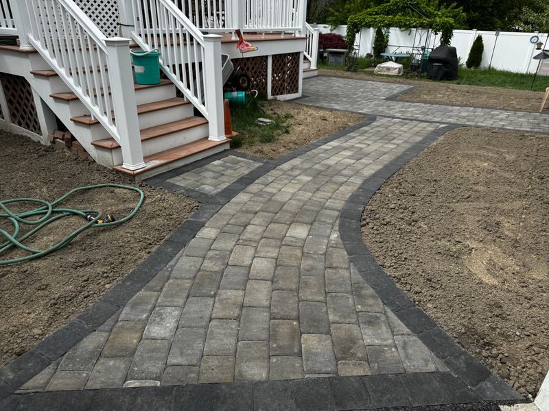 Seamless Walkway and Patio Transformation by Brouder & Sons: Revitalizing Outdoor Spaces with Expert Hardscaping