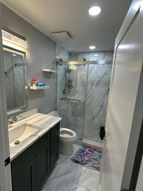 Elevate Your Home: Luxurious Bathroom Transformation by Start 2 Finish LLC Contracting Services