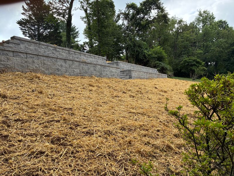 Transforming Landscapes: Durable Block Retaining Wall Installation