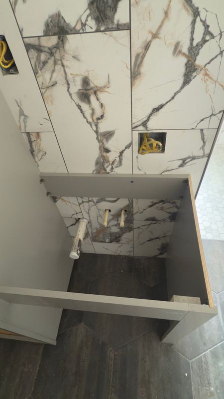Converting 2 Bathrooms into 1
