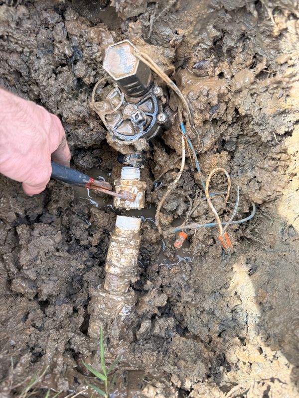 Sprinkler system repair.