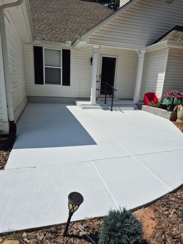 Enhancing Curb Appeal: A Stunning Concrete and Landscape Transformation by WCDI Design & Build