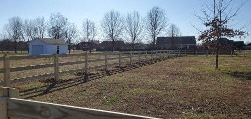 Ranch-Style Elegance: Transforming Lou'monta Hills with Patriot Fence's Premier 3-Rail Installation