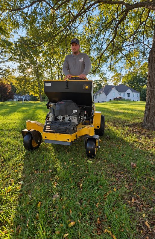 Aerating and overseeding