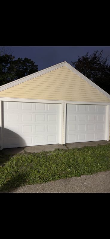 Two New Garage Doors, New Openers, and Reframed From Scratch
