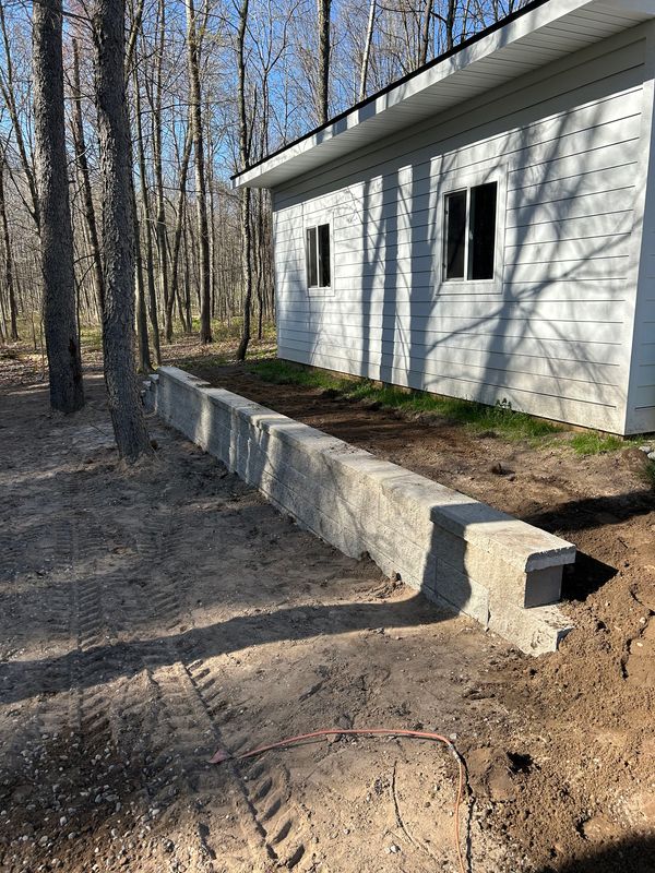 Concrete Block Retaining Wall Built to Hold and Impress
