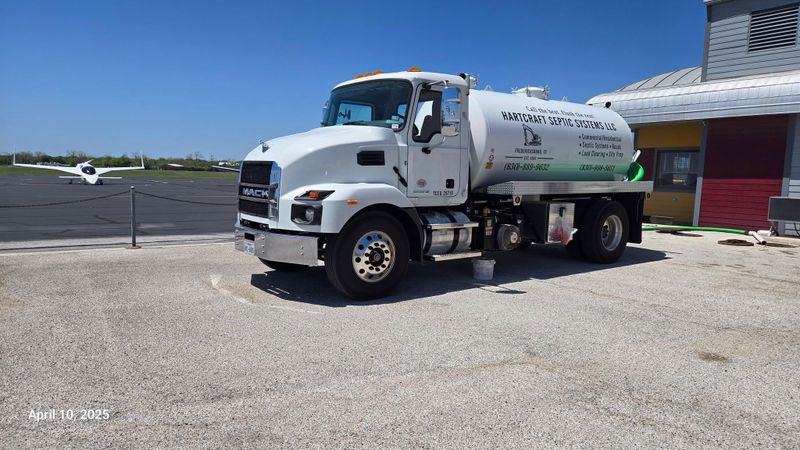 Commercial kitchen grease interceptor cleaning
