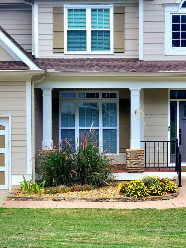 Front Yard Transformation: Stunning Stonework and Blooms by WCDI Design & Build