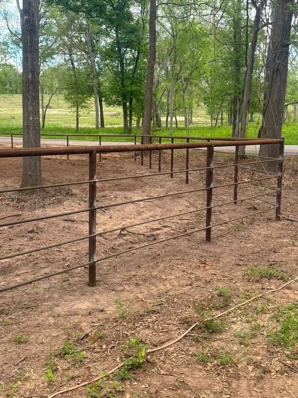 Custom Pipe fencing, entrances and riding arena
