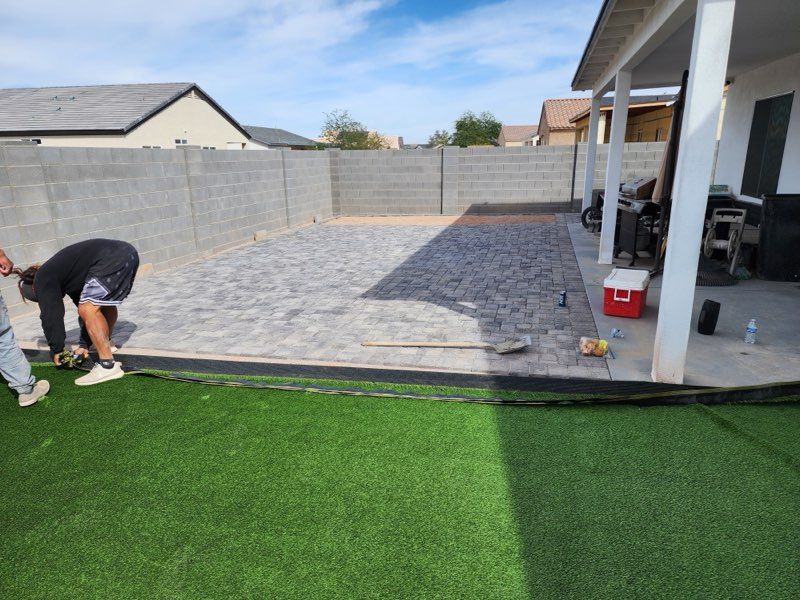 Transforming Spaces with Custom Concrete and Artificial Turf