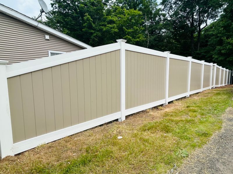 Elegant Privacy Redefined: Fencescapes LLC's Premium Vinyl Installation for Secure Living