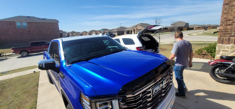 Blue and white GMC