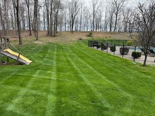 Aerating and overseeding